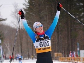 Whitehorse's Dahria Beatty celebrates her victory in the women's 10K skating style competition Thursday, March 14, 2019 at the Canadian Ski Championship's Surge pursuit race at the Nakkertok Nordic Ski Centre.