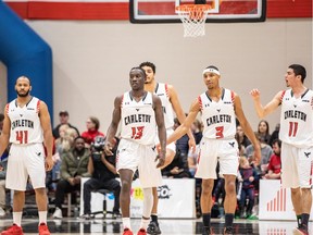 Carleton University men's basketball team is ranked #` in the country, 
Troy Reid-Knight (41) Munis Tutu (13),   Marcus Anderson (3) and T.J. Lall, (11)