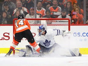 Flyers forward Sean Couturier scores the game-winning goal in the shoot-out against Maple Leafs goalie Frederik Andersen on Wednesday night in Philadelphia. (Bruce Bennett/Getty Images)