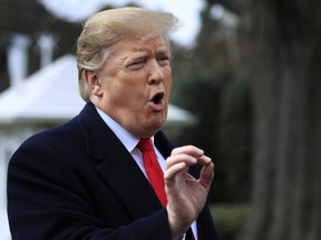 U.S. President Donald Trump speaks to reporters before leaving the White House in Washington, Wednesday, March 20, 2019, for a trip to visit a Army tank plant in Lima, Ohio, and a fundraising event in Canton, Ohio.