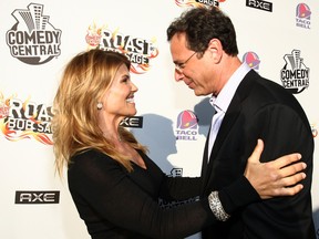 Lori Loughlin and Bob Saget arrive to "Comedy Central Roast of Bob Saget" at the Warners Brothers Studio Lot on August 3, 2008 in Burbank, Calif. (Alberto E. Rodriguez/Getty Images for Comedy Central)