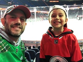 Glen Lowry with his son, Adam Lowry-Burmester. 
Adam hasn't come back down to Earth since Ottawa Senators rookie Brady Tkachuk engaged in a floss-off dance competition with him before a game in Calgary.