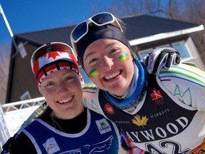 Hannah Shields and Zoe Williams celebrate after winning the women's team sprint event at the Canadian Ski Championships at Nakkertok Nordic Ski Centre on March 18, 2019. (ROB SMITH/PHOTO)