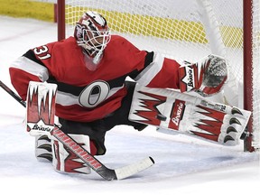 Ottawa Senators goaltender Anders Nilsson (31) makes a save during the third period against the St. Louis Blues in Ottawa, Thursday March 14, 2019.