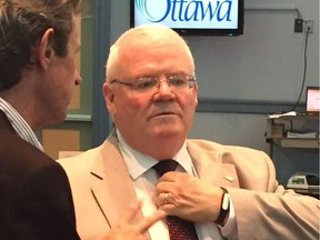 A 2017 file photo of City of Ottawa auditor general Ken Hughes, right.