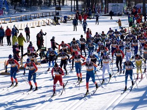 Athletes head out in the mass-start men's 50K classic-style race on Tuesday at the Nakkertok Nordic Ski Centre.
