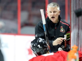 Ottawa Senators coach Marc Crawford talks to the team during practice on Wednesday, March 13, 2019.