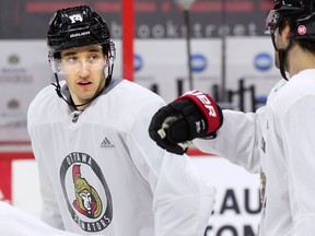 New Ottawa Senator Max Veronneau listens to some instructions during practice on Wednesday, March 13, 2019.