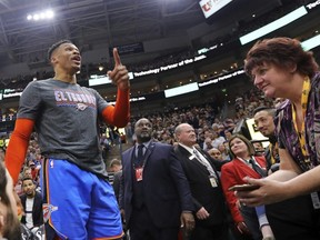 Thunder's Russell Westbrook gets into a heated verbal altercation with fans in the first half of an NBA game against the Jazz in Salt Lake City, Monday, March 11, 2019.