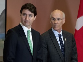 Prime Minister Justin Trudeau stands with Clerk of the Privy Council Michael Wernick during a cabinet shuffle at Rideau Hall in Ottawa on Friday, March 1, 2019.