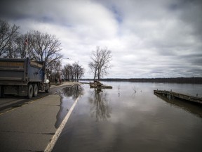 The low lying areas around Ottawa and Gatineau were hit with the beginning of the flooding near the rivers, Sunday, April 21, 2019. Gatineau city crews were out trying to save boulevard Hurtubise to keep one lane open for residents and emergency vehicles Sunday afternoon. The Ottawa River has flooded the many parts of the road.   Ashley Fraser/Postmedia