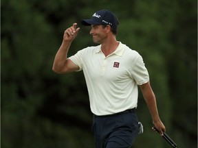 Adam Scott of Australia acknowledges the gallery on the 18th green during the second round of the Masters at Augusta National Golf Club on April 12, 2019.