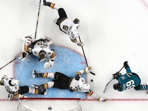 Brayden McNabb #3, Deryk Engelland #5, Tomas Nosek #92, and goalie Marc-Andre Fleury #29 of the Vegas Golden Knights are able to stop Logan Couture #39 of the San Jose Sharks from scoring during a power play in the second period in Game Five of the Western Conference First Round during the 2019 NHL Stanley Cup Playoffs at SAP Center on April 18, 2019 in San Jose, California.