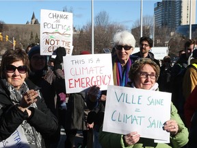 Ottawa residents rallied outside Ottawa City Hall to demonstrate support for a motion to declare a climate emergency, April 16, 2019.