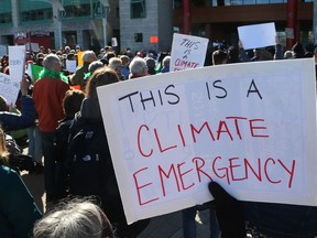 Ottawa residents rallied outside Ottawa City Hall last week to demonstrate support for a motion to declare a climate emergency.