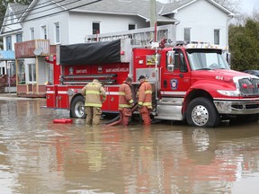 Homes and streets of Saint-André-Avellin are flooded by the the Petite-Nation River on Wednesday.