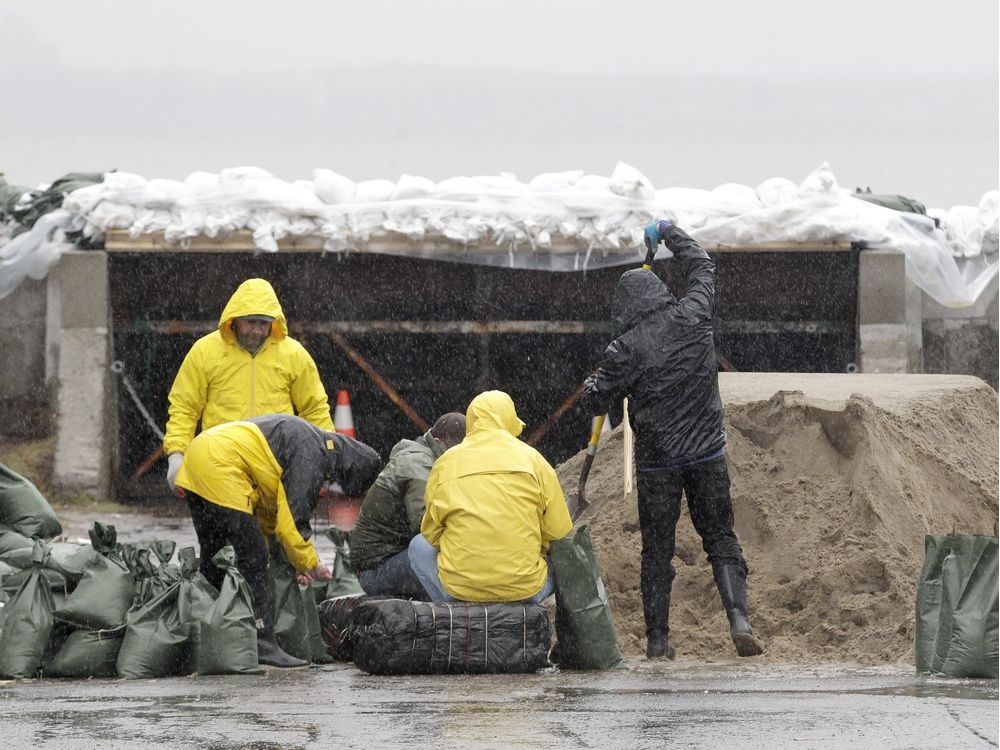GIBBONS As the Ottawa River invades, the Rubber Boot Army answers the