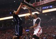 Toronto Raptors' Norman Powell dunks the ball against the Orlando Magic during Tuesday's game. (JACK BOLAND/Toronto Sun)
