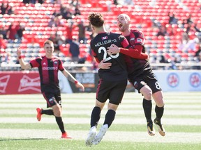 Members of Ottawa Fury FC celebrate a goal against Atlanta United 2 at TD Place Stadium on Sunday. (Matt Zambonin/Freestyle Photography)