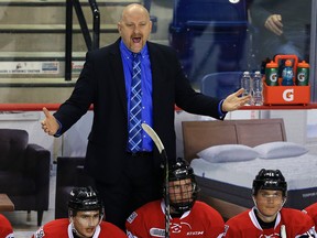 67’s head coach Andre Tourigny was given high praise from OHL legend Brian Kilrea.   Vaughn Ridley/Getty Images