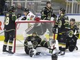 Guelph Storm captain Isaac Ratcliffe was all smiles after teammate MacKenzie Entwistle scored to put the team up 5-3 against the London Knights in London, Ont. on April 16, 2019. Knights players left to right are Liam Foudy, Jordan Kooy, William Lochead, Billy Moskal, and Alec Regula.