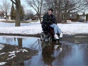 Stephen St. Denis poses for a photo in front of a mud hole at Ruth Wilgen Park in Ottawa.