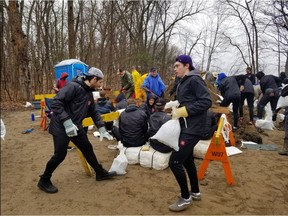 The Ottawa 67s help out with sand bagging in the Constance Bay area. Chris Hofley, OSEG via Twitter