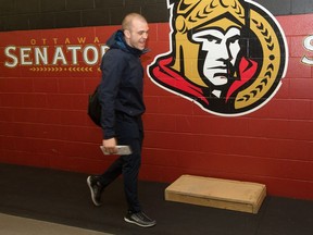 Mark Borowiecki walks past the Sens logo as the Ottawa Senators wrap up their season by clearing out their lockers and head home.