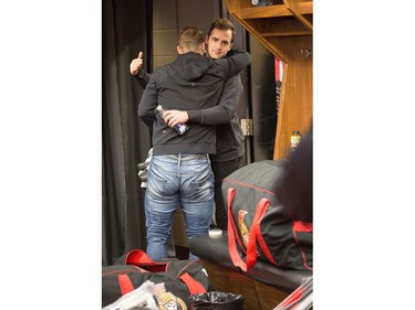 Mikkel Boedker (L) gives Colin White a hug as the Ottawa Senators wrap up their season by clearing out their lockers and head home.