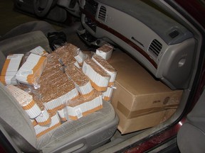 Contraband cigarettes seized near Cornwall, Ont. are shown in an RCMP handout photo.A new study suggests nearly a third of cigarettes sold in Ontario are purchased illegally. (THE CANADIAN PRESS/HO-RCMP)
