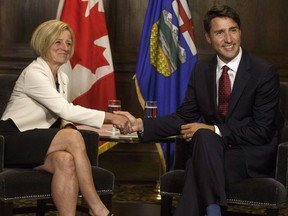 Prime Minister Justin Trudeau, right, and Alberta Premier Rachel Notley meet in Edmonton on September 5, 2018. THE CANADIAN PRESS/Jason Franson