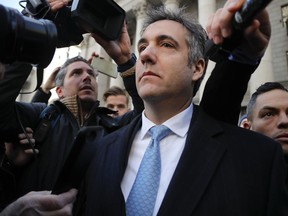 In this Nov. 29, 2018, file photo, Michael Cohen walks out of federal court in New York.