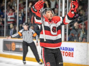 Ottawa 67's centre Sasha Chmelevski celebrates an Ottawa goal against the Hamilton Bulldogs.