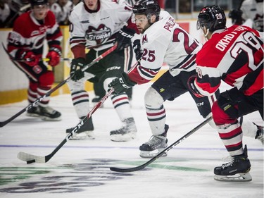 Guelph Storm Markus Phillips brings the puck down the ice during the game against the Ottawa 67's at TD Place Arena on Saturday.