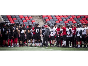 The Ottawa Redblacks training camp kicked off Sunday May 19, 2019, at TD Place. Redblacks coach Rick Campbell talks with the players.