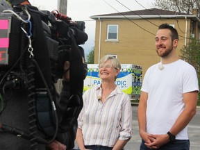 Alison Shorey and Harris Lemon of Frontenac Paramedic Services film with the Swiss show Job Swap at the service's Palace Road station in Kingston, Ont., on Wednesday, May 22, 2019. Steph Crosier/The Whig-Standard/Postmedia Network