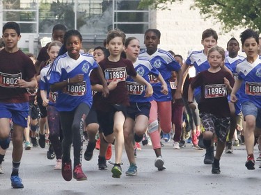 Runners take part in the kids marathon at the Ottawa Race Weekend on Sunday, May 26, 2019.