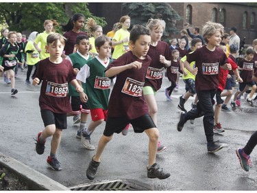 Runners take part in the kids marathon at the Ottawa Race Weekend on Sunday, May 26, 2019.