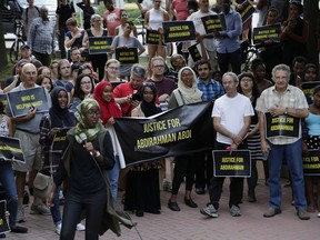 Activists organized a rally in front of Ottawa Police headquarters on Elgin Street on Aug. 24, 2016, to demand justice for the death of Abdirahman Abdi who died after an altercation with police.