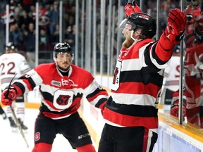 Ottawa's Tye Felhaber (right) throws his arms in the air in jubilation after making it 2-0 for Ottawa in the first period. He's congratulated by teammate Sasha Chmelevski, who scored Ottawa's first goal. The Ottawa 67s took on the Guelph Storm in the first game of the OHL final on Thursday, May 2, 2019 at TD Place.