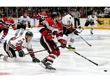 Ottawa's Lucas Chiodo (centre) takes the puck down the ice for what appeared to be Ottawa's first goal in the opening minutes, but it was disallowed after review.