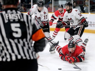 Ottawa's Marco Rossi swings at the puck after getting knocked down during first period action of the Ottawa 67's matchup against the Guelph Storm in game five of the Eastern OHL final at TD Place in Ottawa Friday.