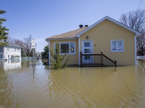 An abandoned house in the flooded Pointe-Gatineau neighbourhood , April 28, 2019