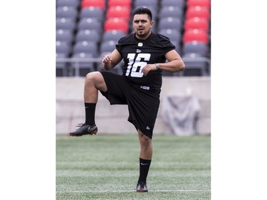 Kicker Jose Maltos stretching during Ottawa Redblacks rookie camp at TD Place on Wednesday, May 15, 2019.