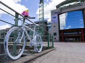 A ghost bike has been installed at Ottawa City Hall, not far from where a cyclist was struck in a hit-and-run late last week. May 21, 2019.