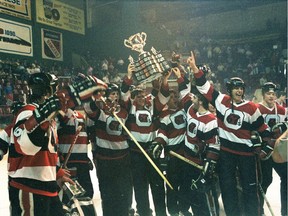 Ottawa 67s captain Brad Shaw raises the Memorial Cup after the 67s beat Laval 7-2 in Kitchener to claim the national championship on May 19, 1984.