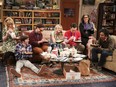 This photo provided by CBS shows, from left, Melissa Rauch Simon Helberg, Johnny Galecki, Kaley Cuoco, Jim Parsons, Mayim Bialik and Kunal Nayyar in a scene from the series finale of "The Big Bang Theory," Thursday, May 16, 2019.