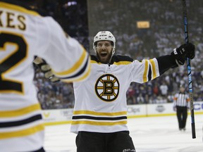 Boston Bruins' David Krejci celebrates a goal against the Columbus Blue Jackets during the third period of Game 6 of an their second-round playoff series on  Monday. Boston won 3-0. (AP Photo/Jay LaPrete)