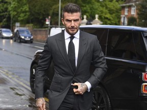 David Beckham arrives at Bromley Magistrates Court for a hearing after he was spotted using his mobile phone while driving his Bentley, in London, Thursday, May 9, 2019.