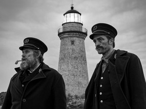 Willem Dafoe and Robert Pattinson on the set of The Lighthouse in Yarmouth, N.S. in this undated handout photo.